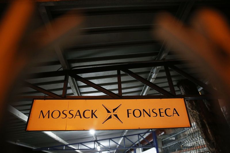 A sign is seen in a parking lot next to the building that houses the law firm Mossack Fonseca & Co