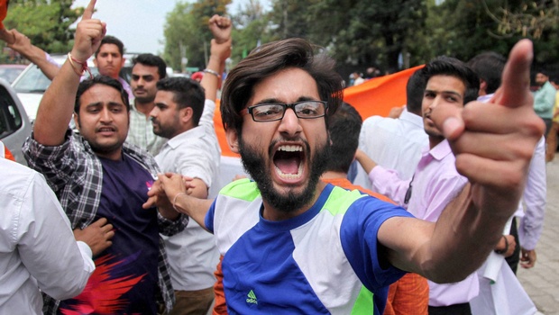 Activists of ABVP protest in front of the vehicle of Director General of Jammu and Kashmir Police over NIT Kashmir issue in Jammu. |PTI