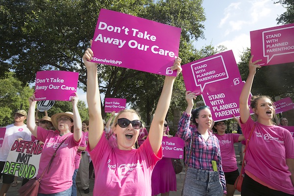 Planned Parenthood supporters gathered outside the Capitol during a similar committee hearing in July