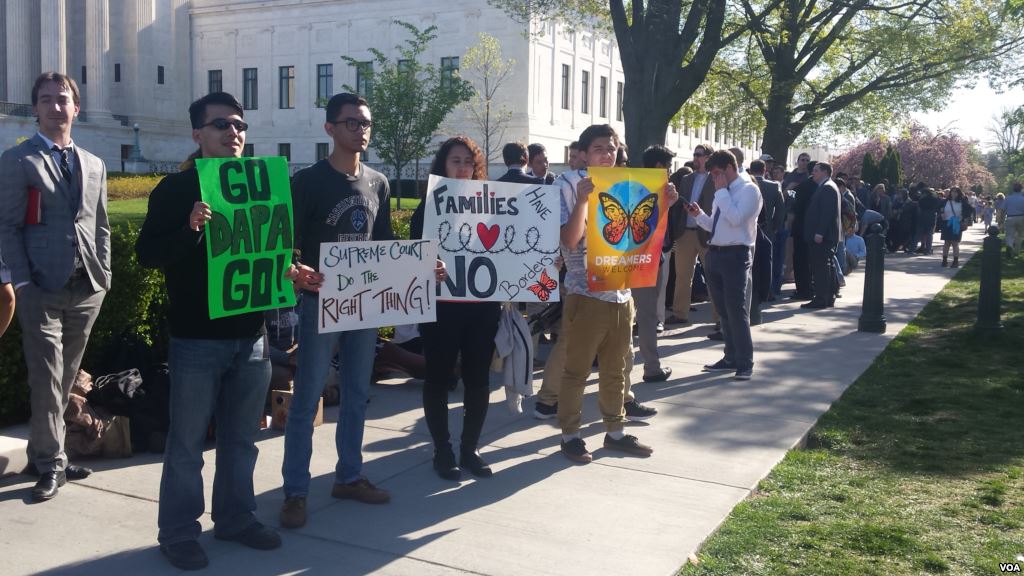 Protesters in front of the U.S. Supreme Court in Washington D.C. ahead of landmark hearing on immigration