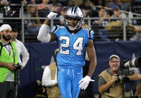 Carolina Panthers&#039 Josh Norman gestures in the end zone after breaking up a pass intended for Dallas Cowboys&#039 Dez Bryant during the second half of an NFL football game in Arlington Texas. Josh