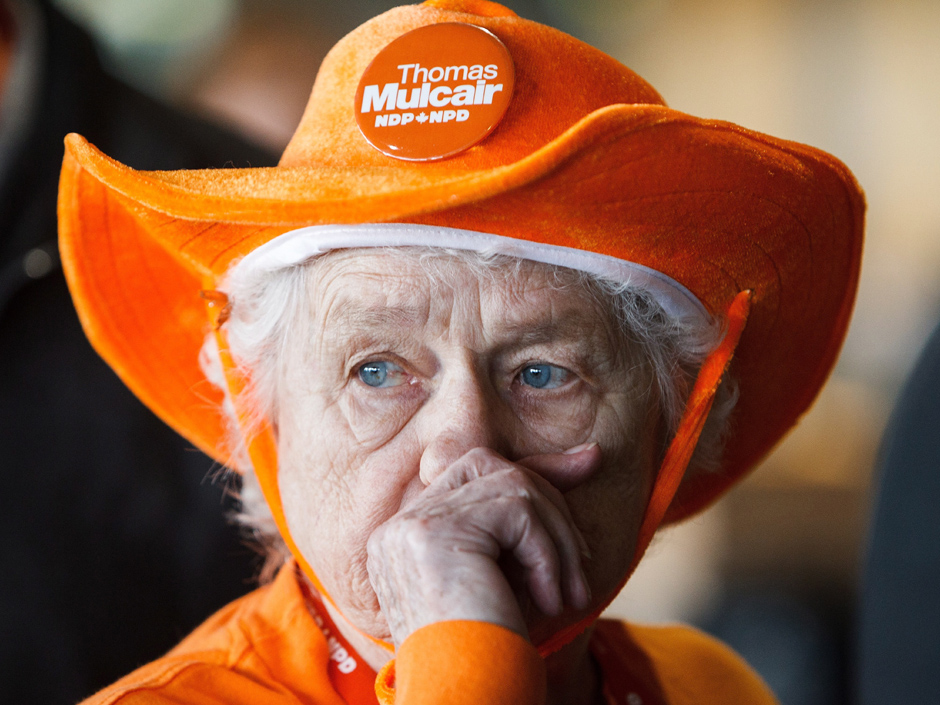 An NDP supporter shows her support with an orange hat during the 2016 NDP Federal Convention in Edmonton on Friday