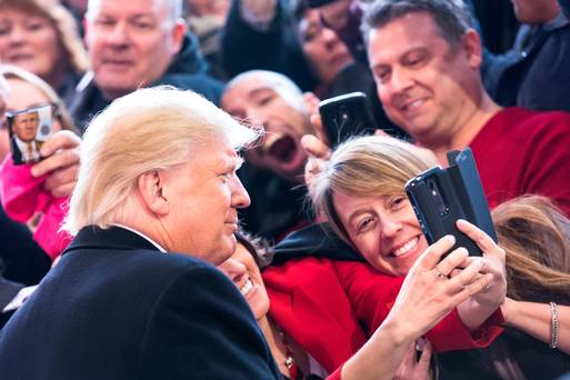 Republican presidential candidate Donald Trump greets the crowd at a rally for his campaign in New York