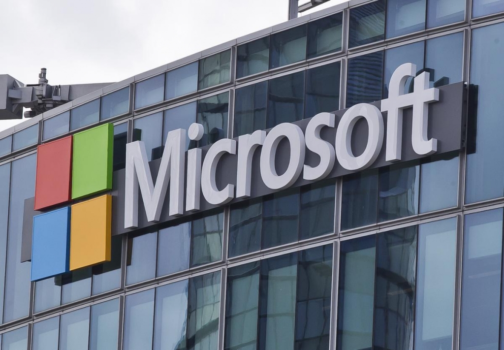 Revenue at Microsoft fell 6 percent to $20.5 billion while profit plunged 25 percent to $3.76 billion. , MICHEL EULER AP