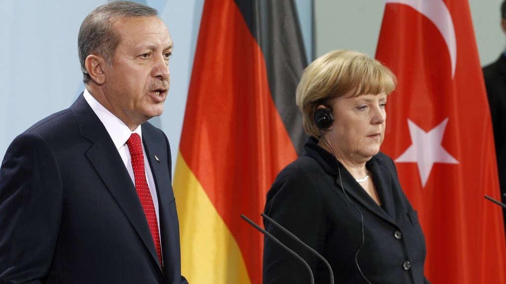 Germany Chancellor Angela Merkel and Turkey's Prime Minister Recep Tayyip Erdogan address the media during a joint press conference after a meeting at the chancellery in Berlin Germany in October 2012