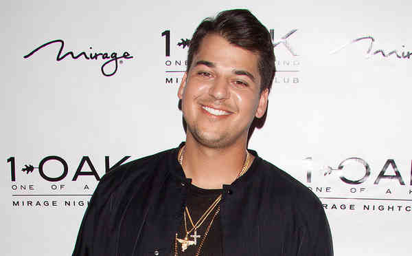 Rob Kardashian's family are reportedly not thrilled by the news he is engaged to Blac Chyna