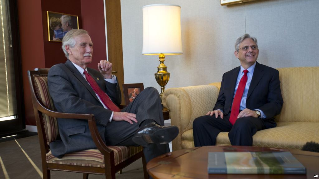 Judge Merrick Garland right President Barack Obama's choice to replace the late Justice Antonin Scalia on the Supreme Court meets with Sen. Angus King an independent from Maine on Capitol Hill in Washington