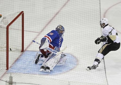 Pittsburgh Penguins Matt Cullen right scores a goal on New York Rangers goalie Henrik Lundqvist of Sweden during the third period of Game 3 of a first-round NHL playoff hockey series Tuesday