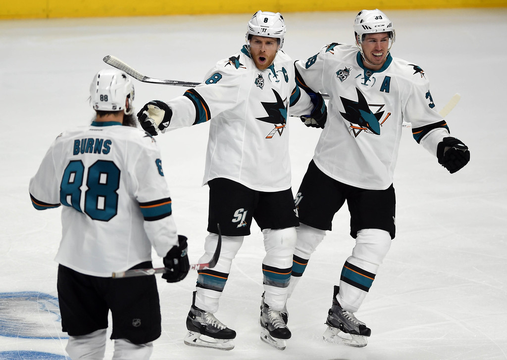 San Jose Shark Joe Pavelsk,8 celebrates his goal with teammates Brent Burns,88 and Logan Couture,39 during the first period of Game 1 Western Conference first-round playoff game at the Staples Center. Los Angeles Calif. Thursday April,14 2016