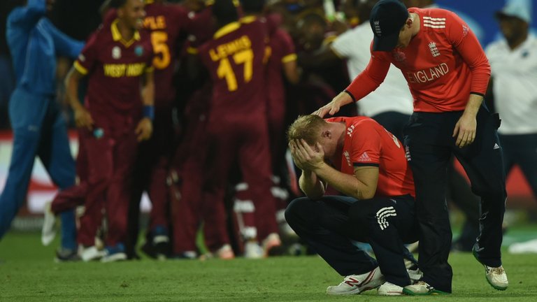 Stokes is consoled by captain Eoin Morgan after the final defeat