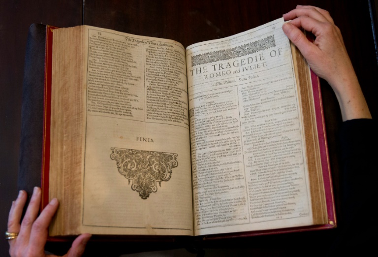 AFP  Justin Tallis An assistant holds a rare edition of William Shakespeare's 'First Folio&#039 during a press preview at Christie's auction house in London