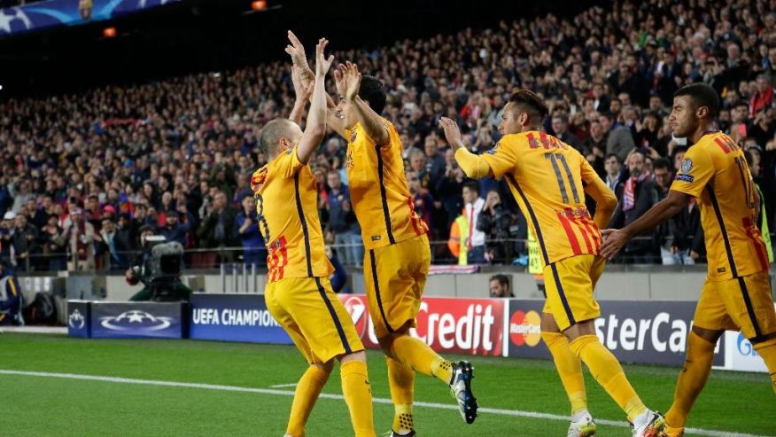 Barcelona's Luis Suarez 2nd left celebrates after scoring his side’s second goal during a Champions League quarter-final first leg soccer match between FC Barcelona and Atletico Madrid at the Camp Nou stadium in Barcelona Spain Tuesday April 5