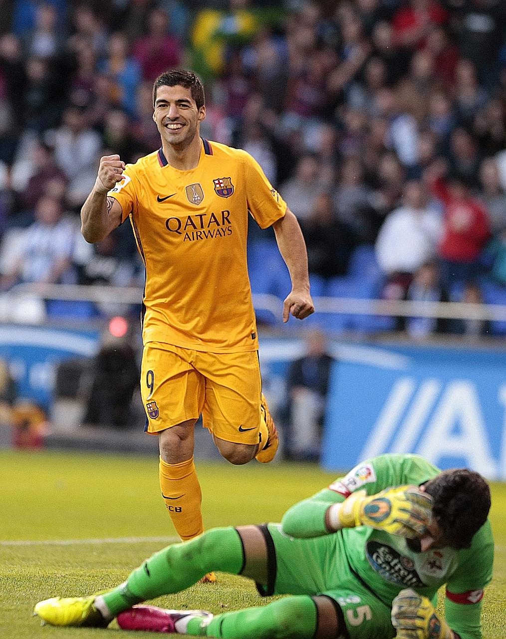 Luis Suarez celebrates completing his hat-trick against Athletic Bilbao. He later added another goal to take his season's tally to 30 clawing within one of Cristiano Ronaldo in the Pichichi standings