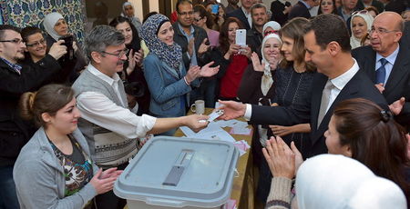 Syrians begin voting for new parliament in government areas