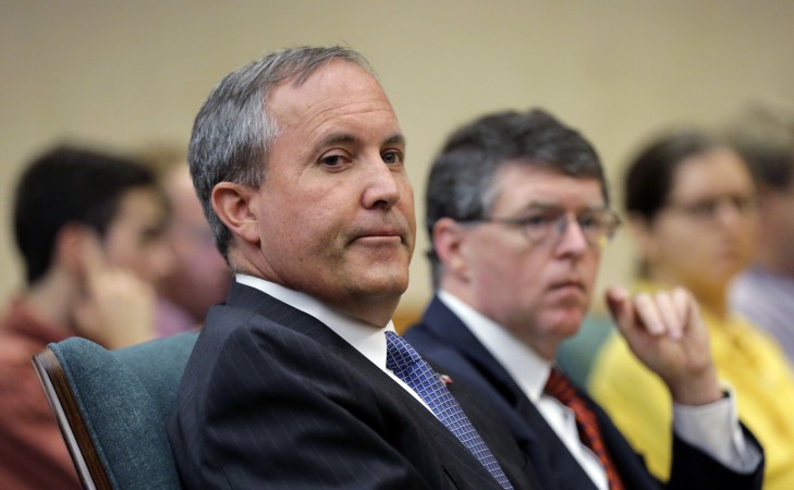 Texas AG Ken Paxton looks during a hearing in Austin Texas. Federal securities regulators have filed civil fraud charges against Paxton Monday