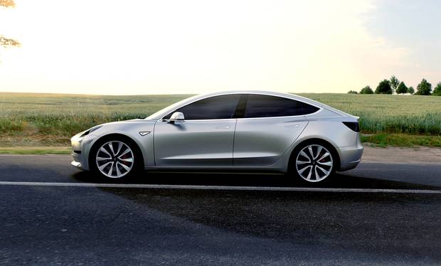 The Model 3 will cost 35,000 dollars and have a range of at least 215 miles per charge the company's chief executive Elon Musk said. PA