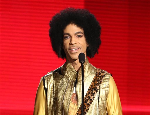 Prince presents the award for favorite album- soul  R&B at the American Music Awards in Los Angeles. Prince widely acclaimed as one of the most inventive and influential musicians of his era with hits including'L