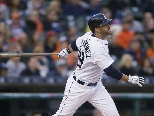 Tigers rightfielder J.D. Martinez watches his three-run home run during the second inning Wednesday at Comerica Park.  Carlos Osorio AP