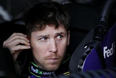 RICHMOND VA- APRIL 23 Denny Hamlin driver of the #11 Fed Ex Ground Toyota prepares to drive during practice for the NASCAR Sprint Cup Series TOYOTA OWNERS 400 at Richmond International Raceway