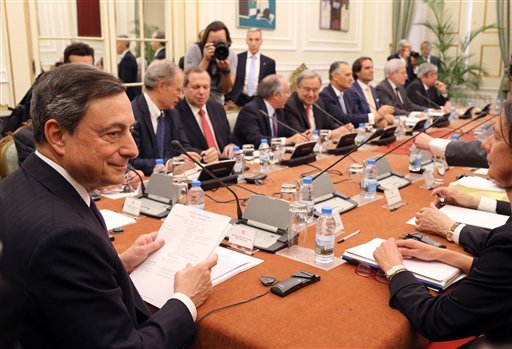 European Central Bank chief Mario Draghi left attends a meeting of Portugal's Council of State at the Belem presidential palace in Lisbon Thursday April 7 2016. The office of Marcelo Rebelo de Sousa Portugal's new head of state said he invited Dragh