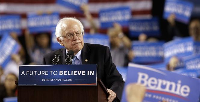 The Latest Sanders says he lags because the poor don't vote