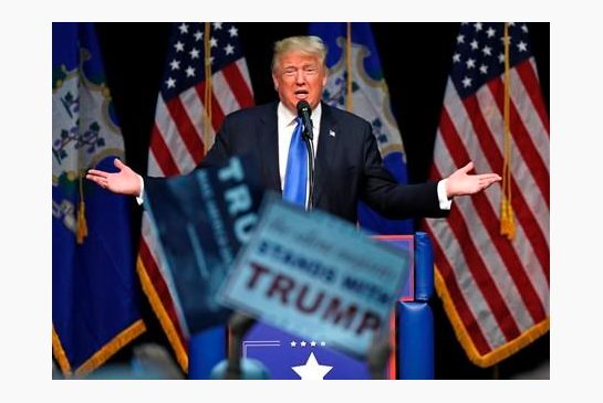 Republican presidential candidate Donald Trump addresses supporters at a campaign event at Crosby High School in Waterbury Conn. Saturday