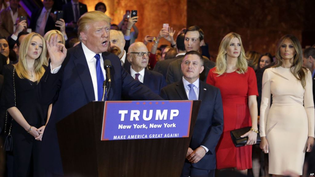 Surrounded by family and supporters Republican presidential candidate Donald Trump speaks during a New York primary night campaign event