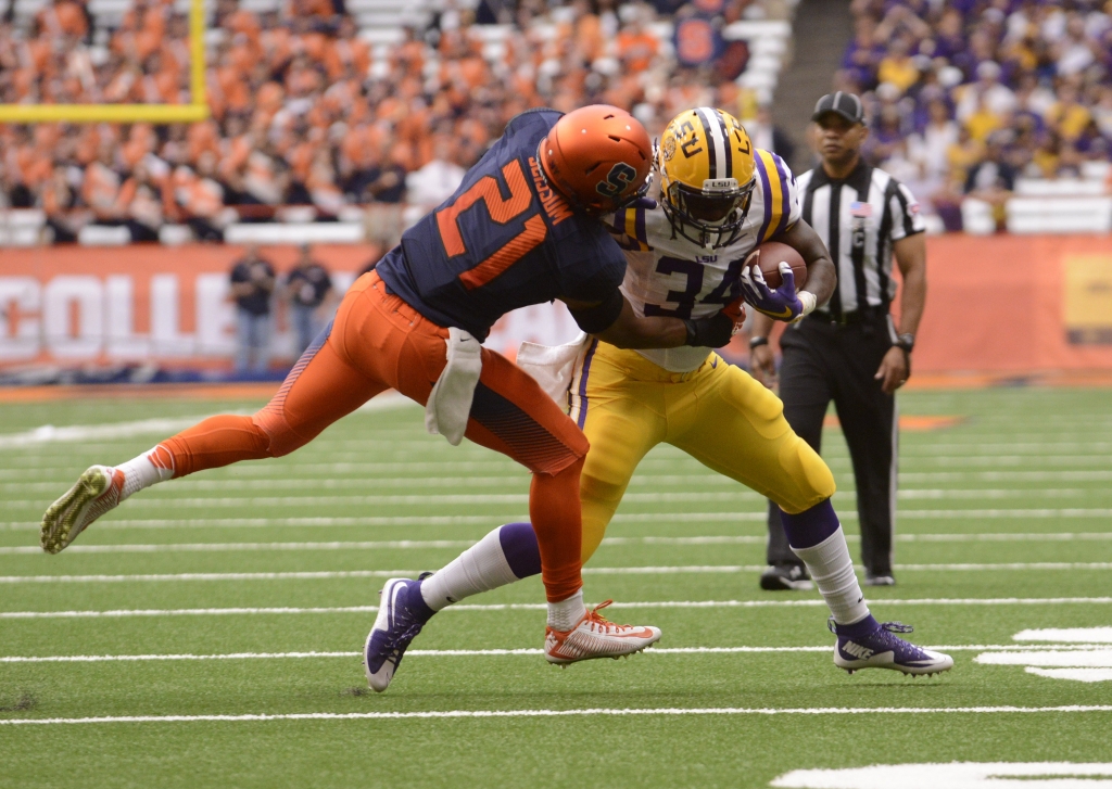 Sep 26 2015 Syracuse NY USA LSU Tigers running back Darrel Williams is tackled by Syracuse Orange safety Chauncey Scissum during the first quarter in a game at the Carrier Dome. Mandatory Credit Mark Konezny-USA TODAY Sports