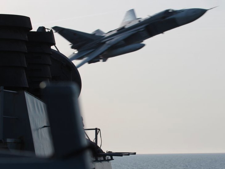 US NavyA Russian Su-24 attack aircraft making very low altitude pass by the USS Donald Cook