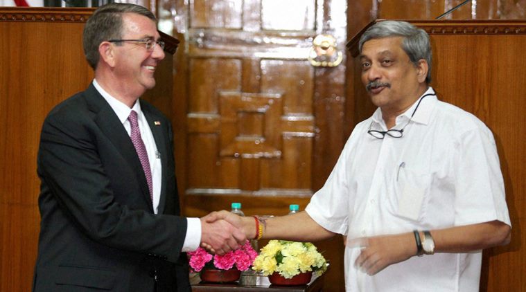 Union Defence Minister Manohar Parrikar shaking hands with his US counterpart Ashton Carter in New Delhi on Tuesday. PTI