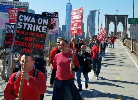 Sanders joins striking workers at Verizon office