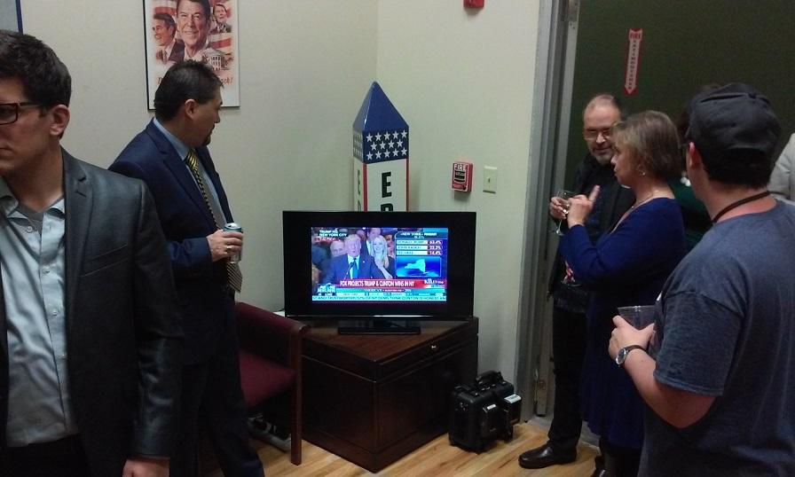 Some of the guests inside Erie County Republican Headquarters watch primary election results. The gathering was low-key but party leadership was most pleased by Donald Trump's convincing win