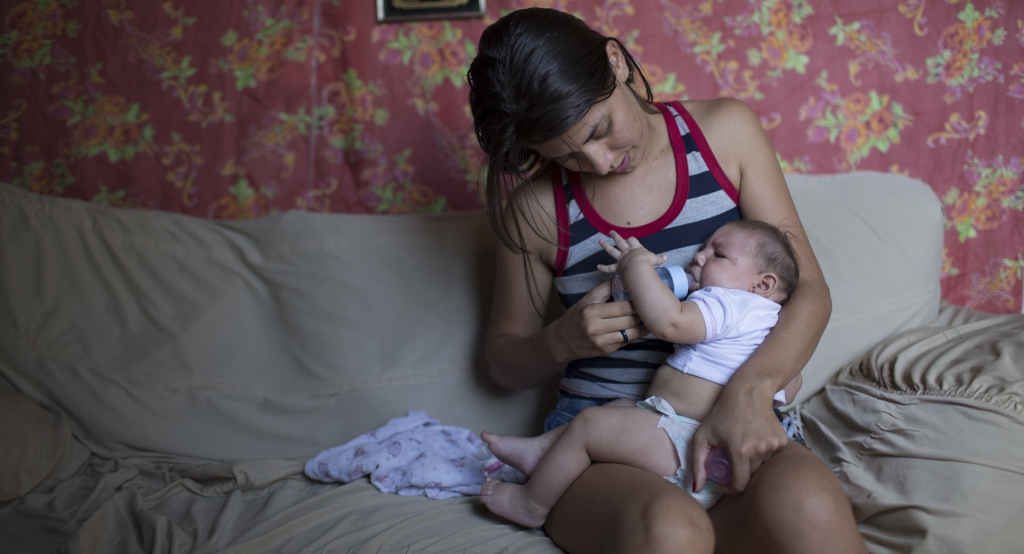 Angelica Pereira feeds her daughter Luiza who was born with microcephaly in Santa Cruz do Capibaribe Brazil Feb. 6 2016