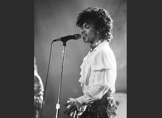 Prince performs at the Orange Bowl during his Purple Rain tour in Miami. Prince widely acclaimed as one of the most inventive and influential musicians of his era with hits including'Little Red Corvette'''Let's Go Cra