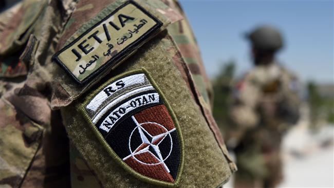 A German soldier from NATO stands guard outside the Shaheen 209th military corps training center in northern Afghanistan