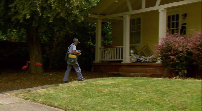 A US Postal worker delivers mail