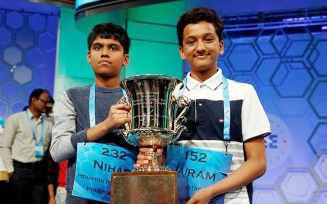 Co-champions Nihar Saireddy Janga and Jairam Jagadeesh Hathwar hold their trophy upon completion of the final round of Scripps National Spelling Bee