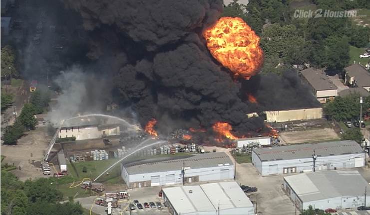 A warehouse fire burns in the Spring Branch neighborhood of Houston