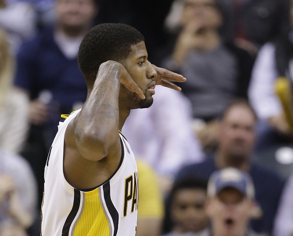 Indiana Pacers&#039 Paul George celebrates after hitting a shot during the second half of an NBA basketball game against the Cleveland Cavaliers Wednesday