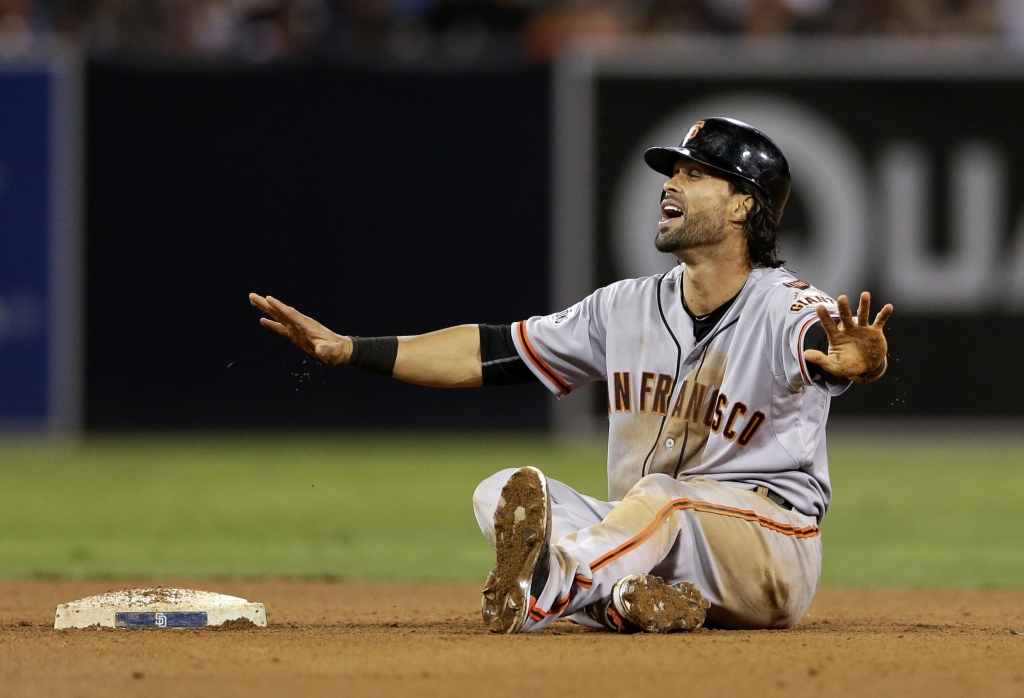 San Francisco Giants&#039 Angel Pagan complains after being called out stealing second base against the San Diego Padres during the ninth inning of a baseball game Thursday Sept. 24 2015 in San Diego. The play was reviewed and Pagan was ruled safe