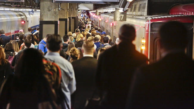 APCrowds board a Metro North train at Grand Central Terminal on Wednesday