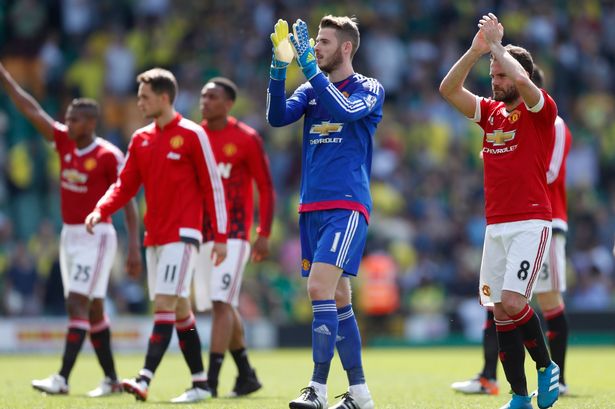 Juan Mata and David De Gea applaud fans after the game