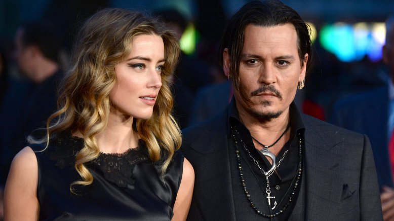 Amber Heard starts battle for Johnny Depp's $400m fortune two days after his mother's death