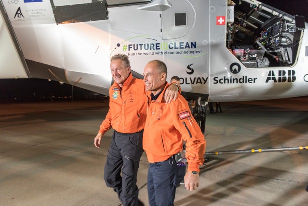 Andre Borschberg and Bertrand Piccard land Solar Impulse 2 in Phoenix.                       AP