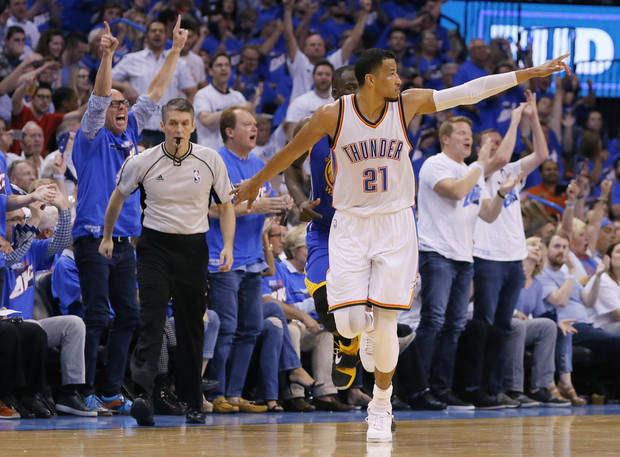 Andre Roberson celebrates a 3-pointer during the Thunder's 133-105 rout of the Warriors in Game 3