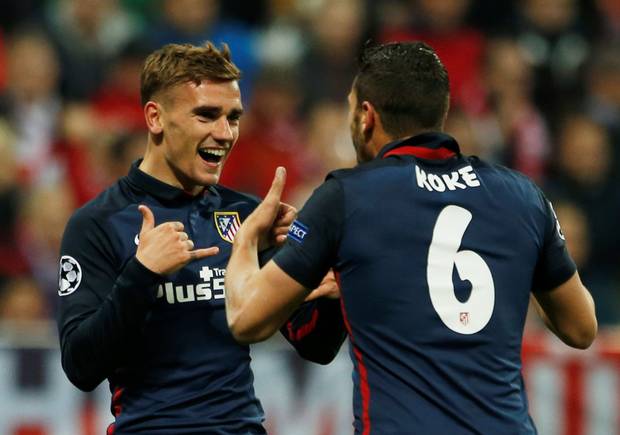 Antoine Griezmann celebrates scoring for Atletico Madrid with team-mate Koke