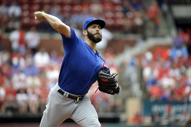 Chicago Cubs starting pitcher Jake Arrieta throws during the first inning of a baseball game against the St. Louis Cardinals Wednesday