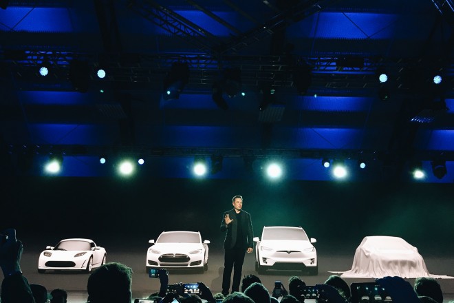 Elon Musk On Stage With Tesla Models At Model 3 Reveal 660x440