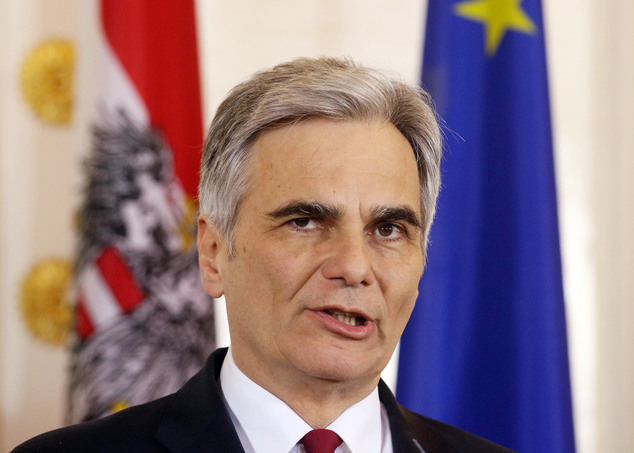 Faymann addresses the media during a news conference after talks with European Council Pre