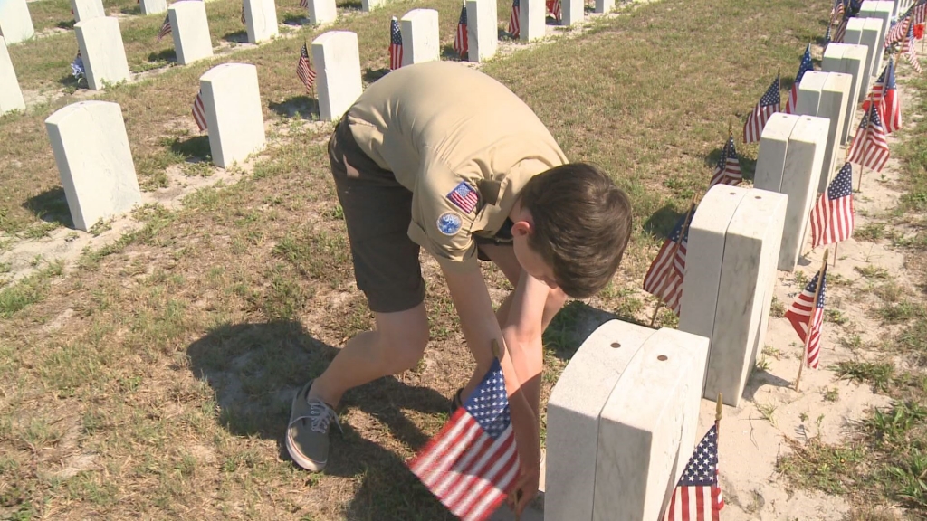 Bay Area scouts place flags on gravesites recall true meaning of Memorial Day